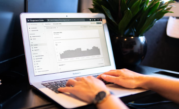 Person using Google Search Console on a laptop