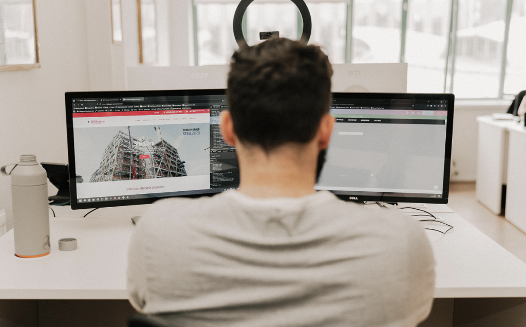 Digital marketing employee at Arise SEO specialist agency working on technical SEO for a client