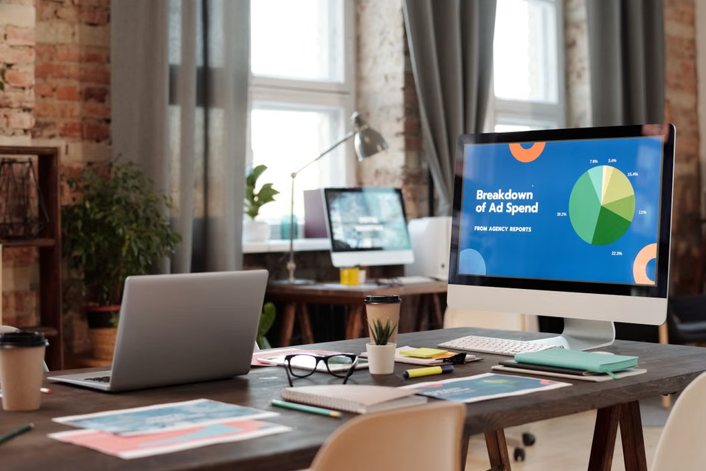 Computer on a desk in an office of a marketing agency showing a breakdown of ad spend